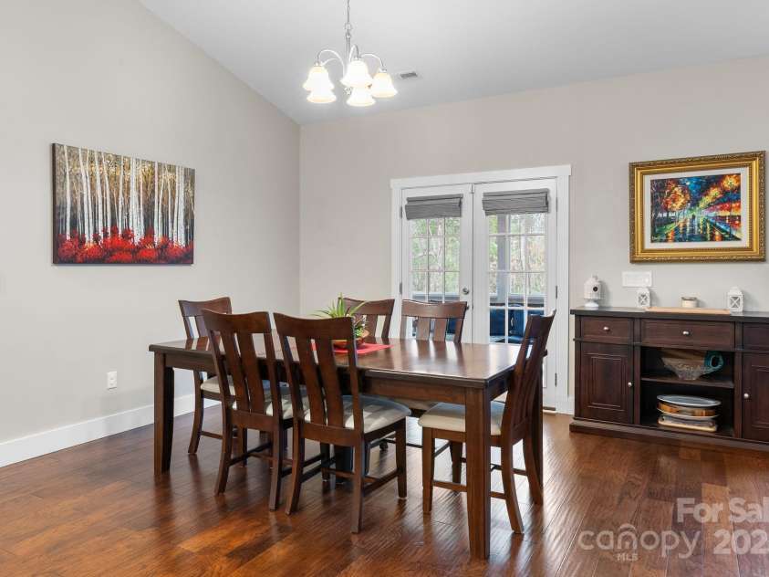 353 Olivet Lane, Fletcher, NC 28732.  MLS# CAR4226055, YatesRealty ID 16483. Dining room open to kitchen and living room