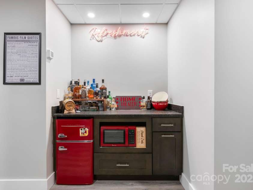 353 Olivet Lane, Fletcher, NC 28732.  MLS# CAR4226055, YatesRealty ID 16483. Prep your movie snacks!