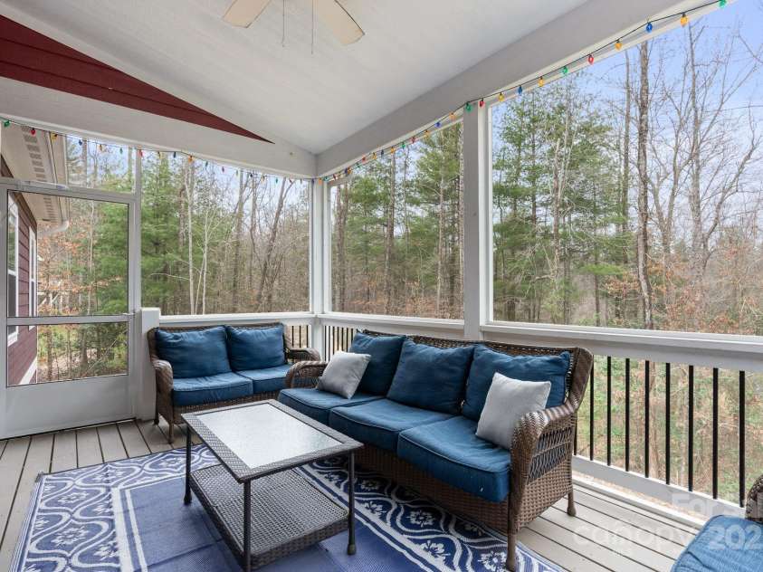 353 Olivet Lane, Fletcher, NC 28732.  MLS# CAR4226055, YatesRealty ID 16483. Screened porch off of dining room