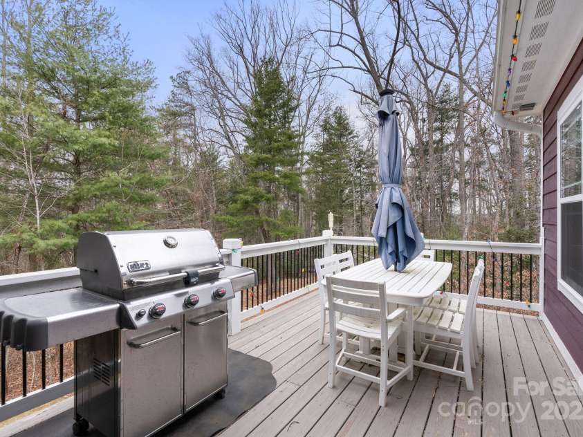 353 Olivet Lane, Fletcher, NC 28732.  MLS# CAR4226055, YatesRealty ID 16483. Uncovered deck off main level