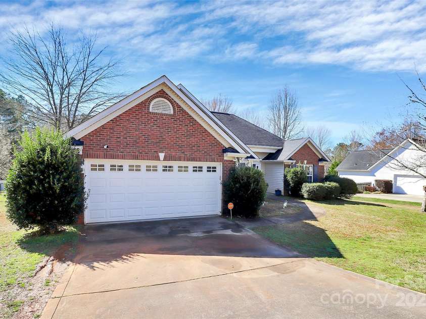 1229 Kent Drive, Lancaster, SC 29720.  MLS# CAR4232716, YatesRealty ID 16484. Two car garage with brick façade