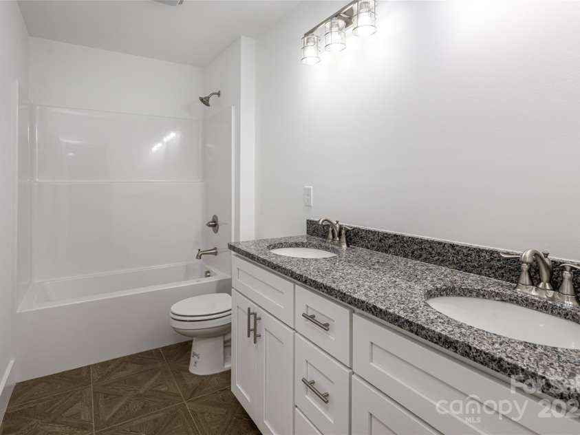 15 Myrtle Lee Cove, Arden, NC 28704.  MLS# CAR4254798, YatesRealty ID 16491. Guest Bathroom
