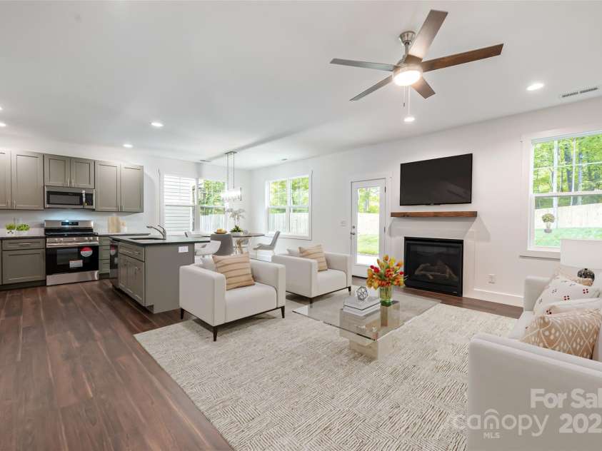 15 Myrtle Lee Cove, Arden, NC 28704.  MLS# CAR4254798, YatesRealty ID 16491. Main level living area - virtually staged