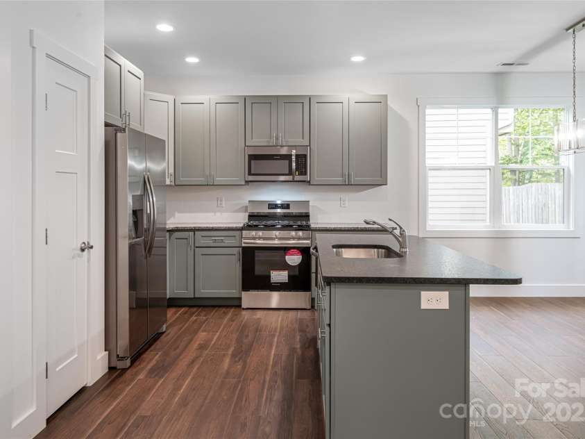 15 Myrtle Lee Cove, Arden, NC 28704.  MLS# CAR4254798, YatesRealty ID 16491. Pantry in kitchen