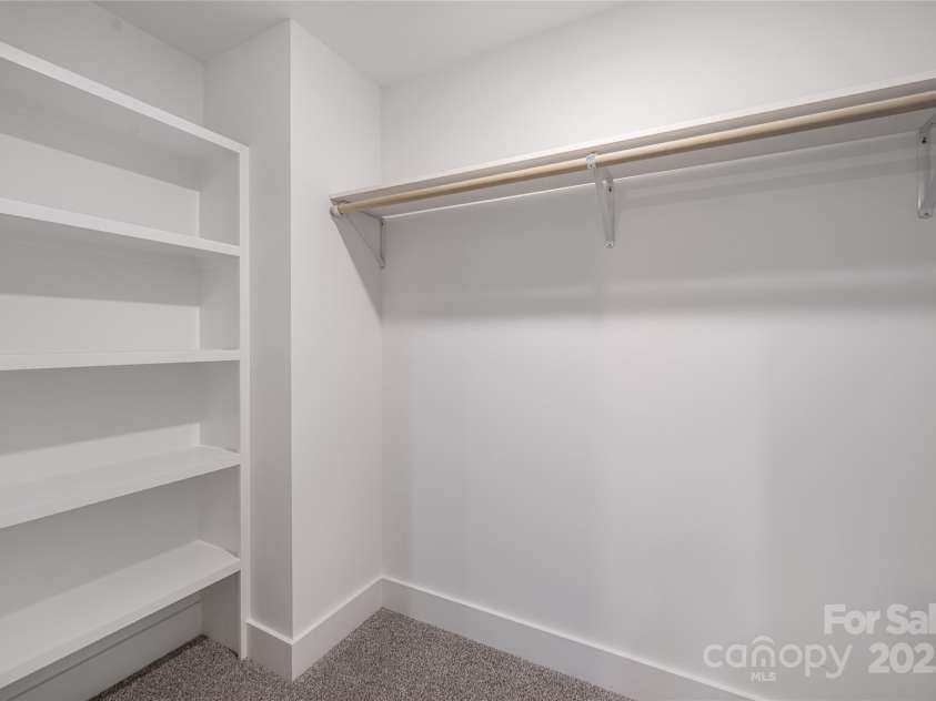 15 Myrtle Lee Cove, Arden, NC 28704.  MLS# CAR4254798, YatesRealty ID 16491. Walk in closet- primary bedroom