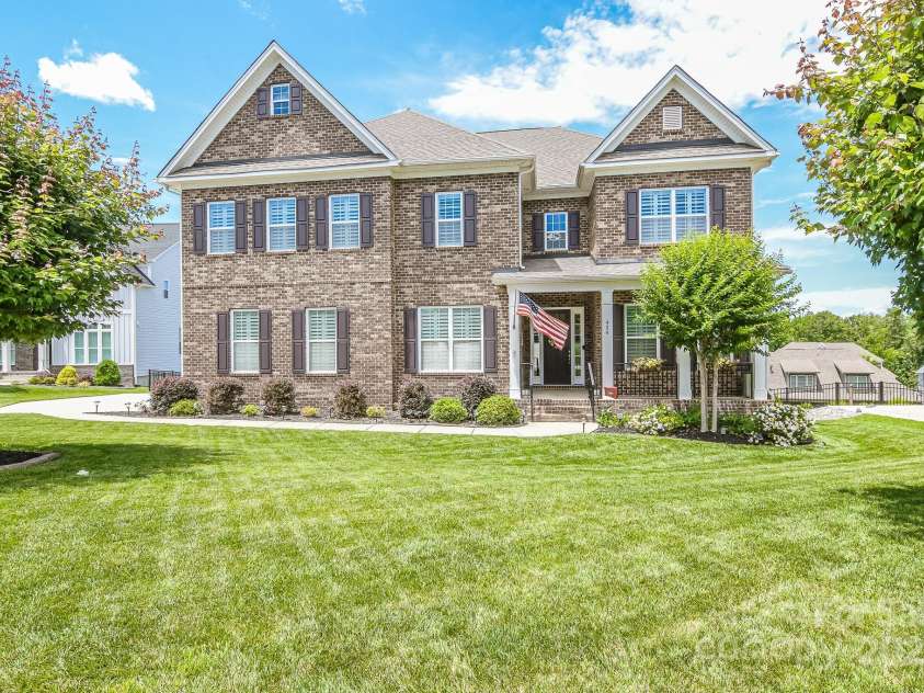 424 Cassia Court, Fort Mill, SC 29708.  MLS# CAR4262614, YatesRealty ID 16495. Brick Front Exterior