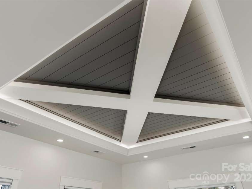 106 Isle Of Pines Road, Mooresville, NC 28117.  MLS# CAR4307196, YatesRealty ID 165. Custom ceiling trimwork in primary bedroom - interior of lot 1 home
