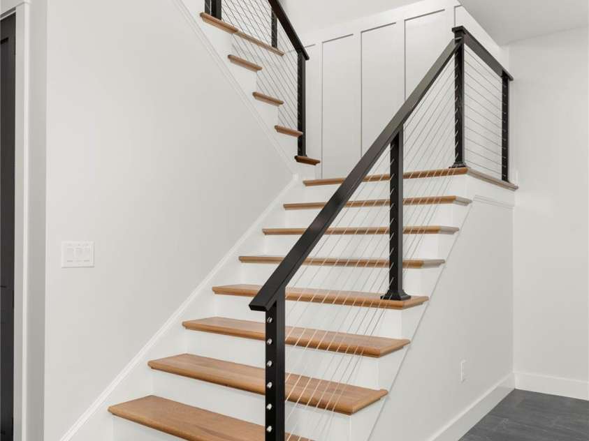 106 Isle Of Pines Road, Mooresville, NC 28117.  MLS# CAR4307196, YatesRealty ID 165. Custom interior cable railing - interior of lot 1 home