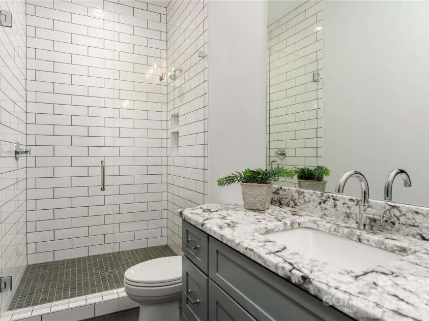 106 Isle Of Pines Road, Mooresville, NC 28117.  MLS# CAR4307196, YatesRealty ID 165. Lower level full bath - interior of lot 1 home