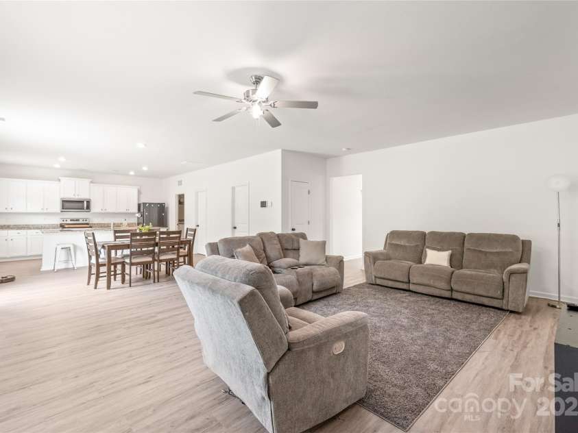 2340 Lanza Drive, Charlotte, NC 28215.  MLS# CAR4264473, YatesRealty ID 16500. Living Room Open to Kitchen