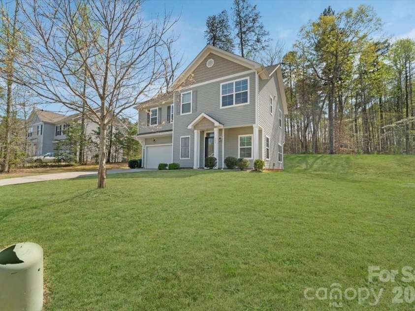 609 Oak Forest Lane, Salisbury, NC 28146.  MLS# CAR4365333, YatesRealty ID 16500. Digitally enhanced lawn