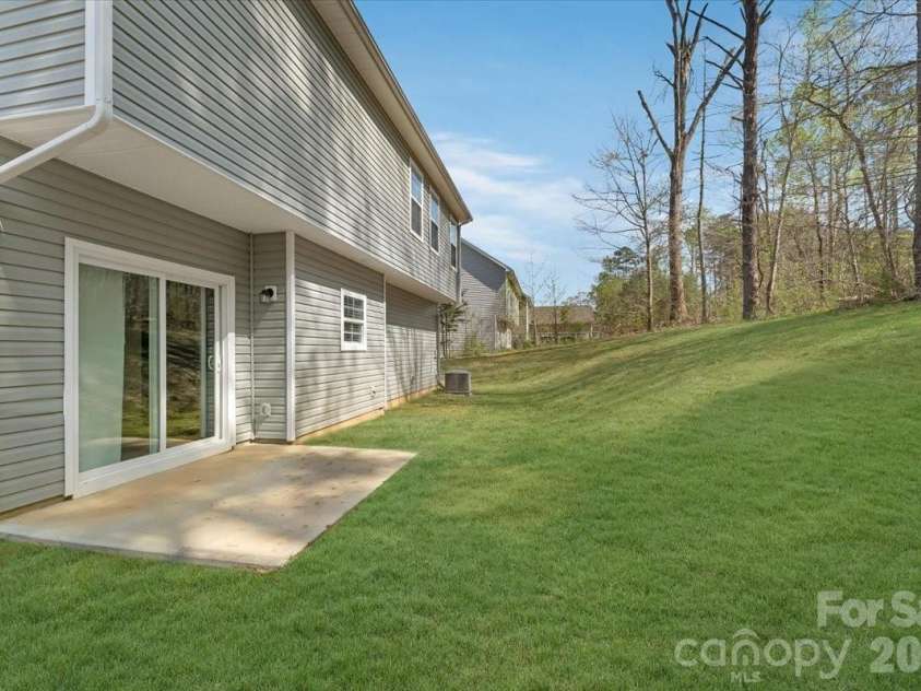 609 Oak Forest Lane, Salisbury, NC 28146.  MLS# CAR4365333, YatesRealty ID 16500. Digitally enhanced lawn