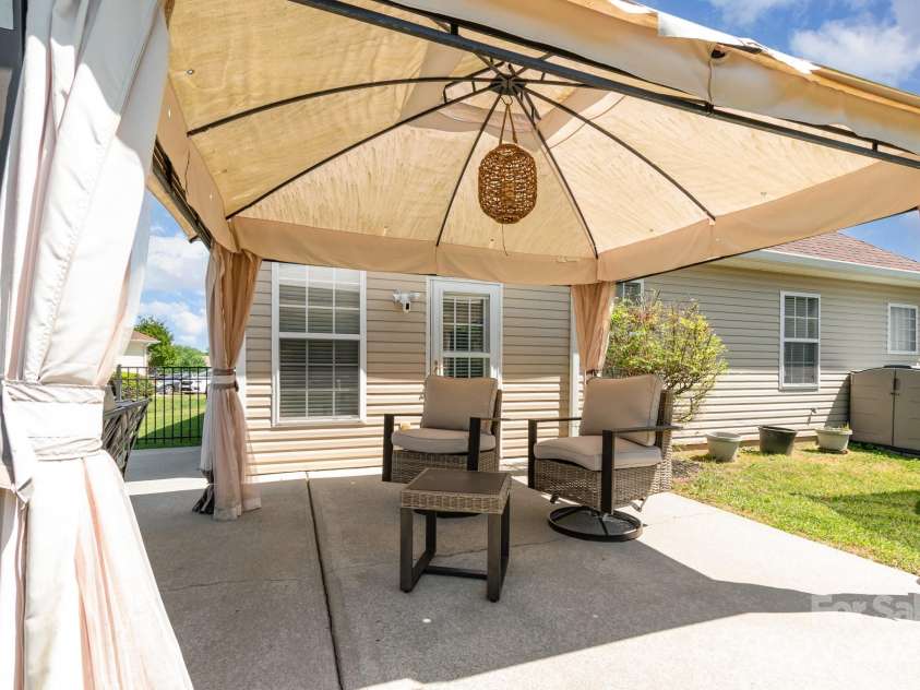 9588 Marquette Street, Concord, NC 28027.  MLS# CAR4252486, YatesRealty ID 16506. Gazebo is mounted down
