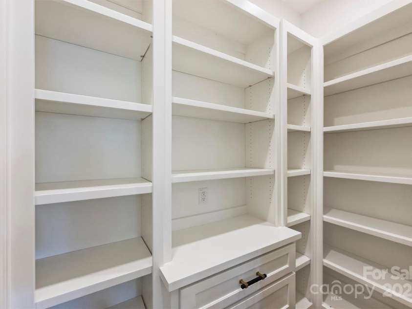 1211 Royal Prince Court, Charlotte, NC 28211.  MLS# CAR4155956, YatesRealty ID 16507. Walk in Pantry w/ shelves and drawers