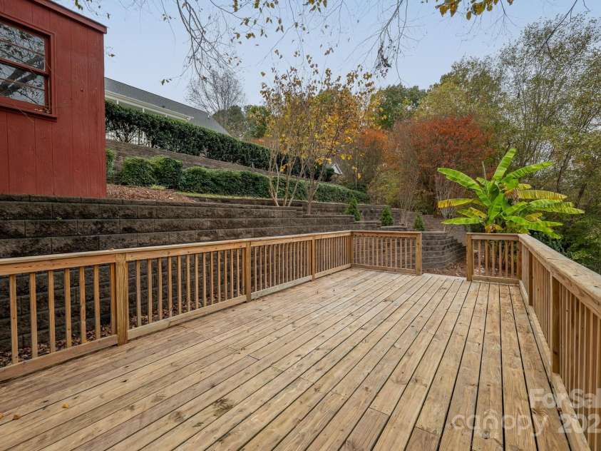271 Lockhard Circle, Troutman, NC 28166.  MLS# CAR4194496, YatesRealty ID 16508. Detached deck provides a space to relax close to the dock