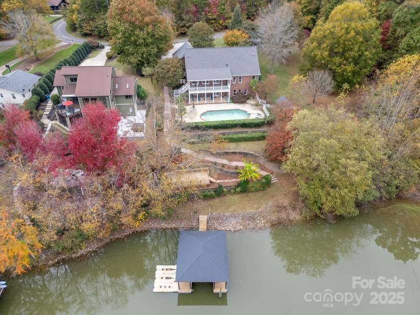271 Lockhard Circle, Troutman, NC 28166.  MLS# CAR4194496, YatesRealty ID 16508. THE QUIET COVE OFFERS A RETREAT FROM LAKE TRAFFIC AND DEEP WATER TO EASILY ACCESS BIG WATER FROM YOUR PRIVATE DOCK