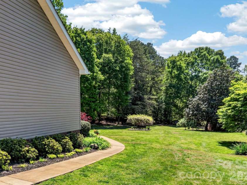 8145 Monbo Road, Catawba, NC 28609.  MLS# CAR4369669, YatesRealty ID 16509. Side yard