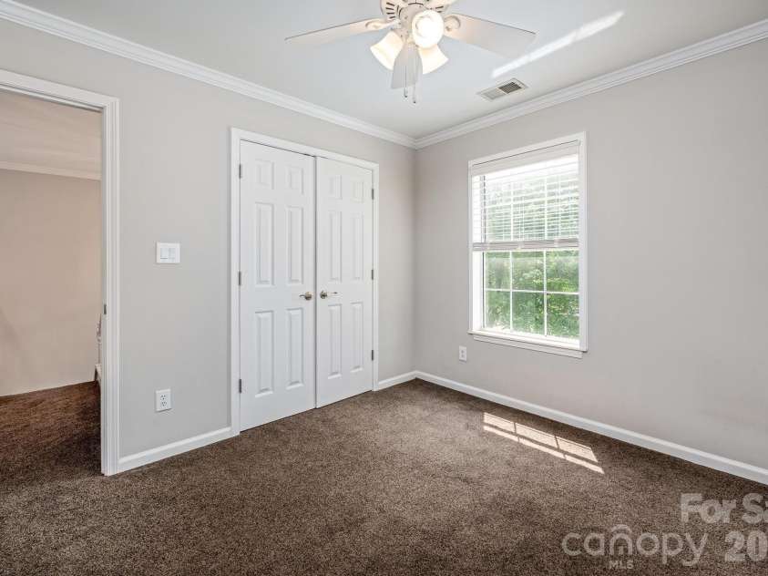 107 Monterey Drive, Mooresville, NC 28117.  MLS# CAR4372310, YatesRealty ID 16510. Second Bedroom