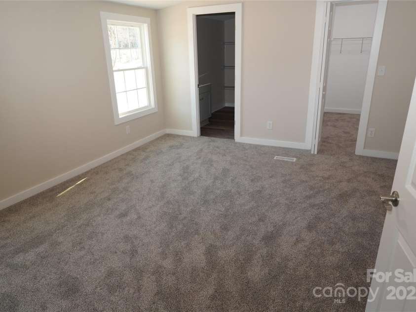 291 Patterson Farm Road, Mooresville, NC 28115.  MLS# CAR4219052, YatesRealty ID 16510. Primary bedroom