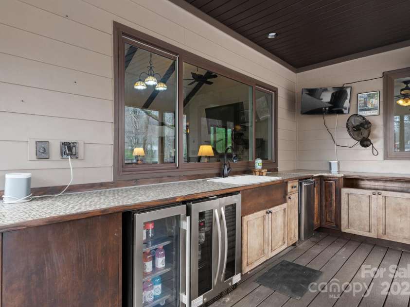 406 Third Avenue, Conover, NC 28613.  MLS# CAR4221672, YatesRealty ID 16511. Entertainment Deck with kitchen