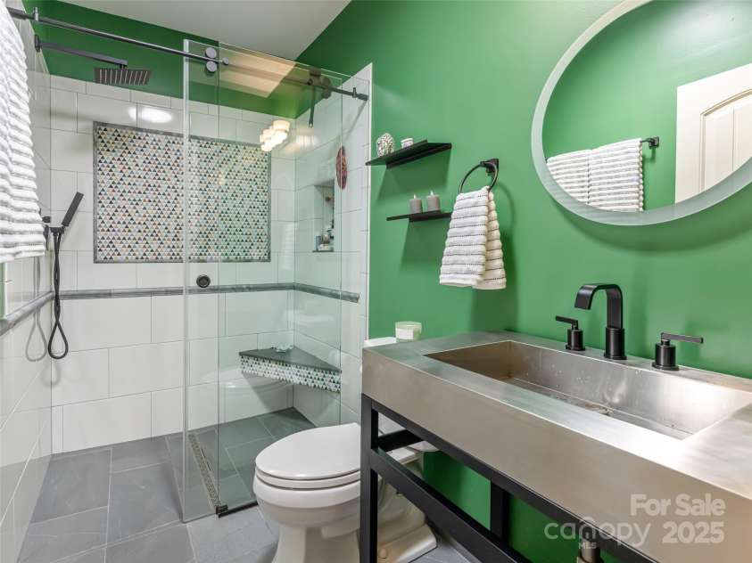 7 Temple Avenue, Asheville, NC 28804.  MLS# CAR4237775, YatesRealty ID 16513. Newly remodeled main bathroom with seamless walk-in shower. 