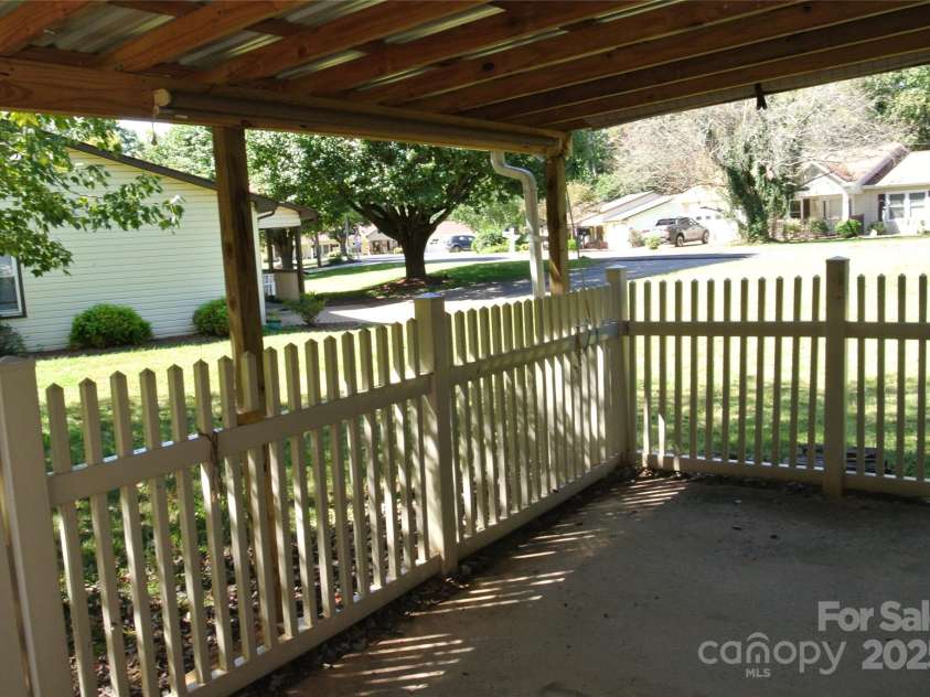 112 Holly Court, Bostic, NC 28018.  MLS# CAR4309584, YatesRealty ID 1652. Covered Patio