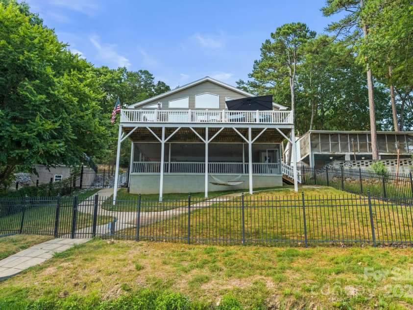 592 Shoreline Road, New London, NC 28127.  MLS# CAR4255512, YatesRealty ID 16527. 