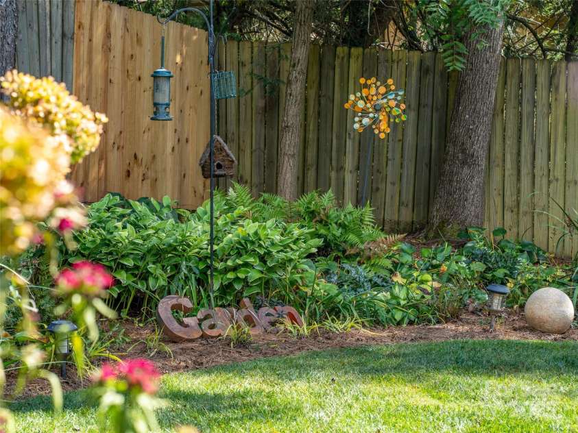 40 Overlook Road, Asheville, NC 28803.  MLS# CAR4300560, YatesRealty ID 16528. Colorful gardens alive with butterfly bushes and cheerful bird feeders