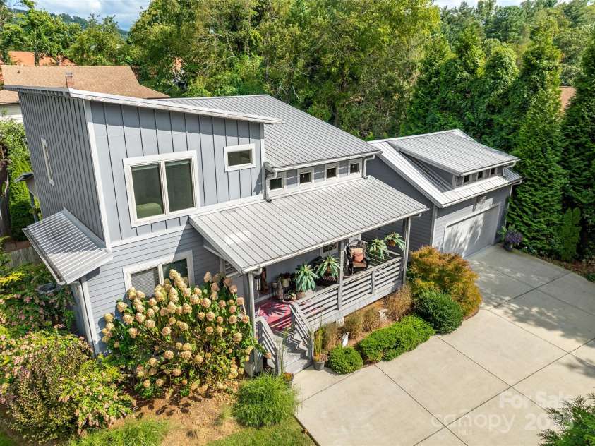 40 Overlook Road, Asheville, NC 28803.  MLS# CAR4300560, YatesRealty ID 16528. Dramatic aerial captures highlighting the home’s modern lines and architectural symmetry