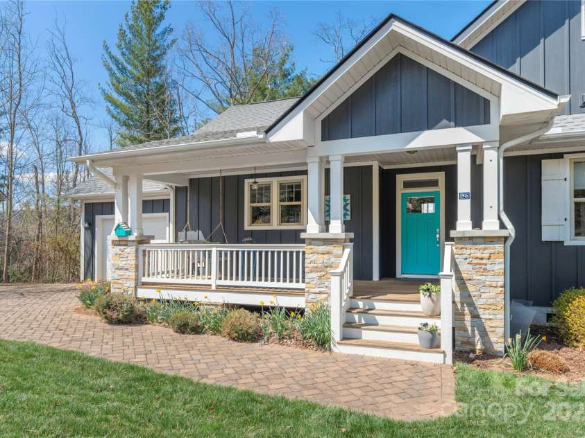 95 Greenwells Glory Drive, Biltmore Lake, NC 28715.  MLS# CAR4247434, YatesRealty ID 16530. Covered front porch