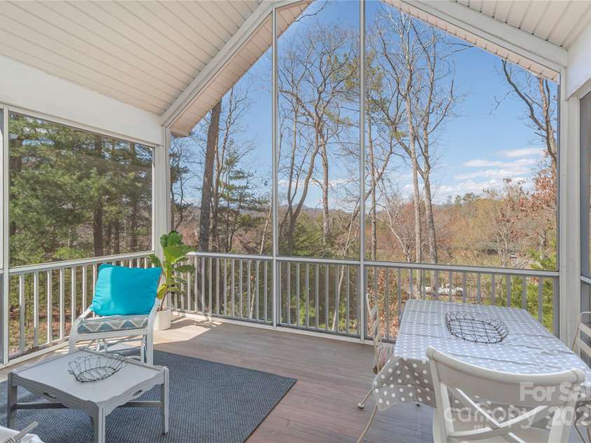 95 Greenwells Glory Drive, Biltmore Lake, NC 28715.  MLS# CAR4247434, YatesRealty ID 16530. Fabulous vaulted screened back porch 