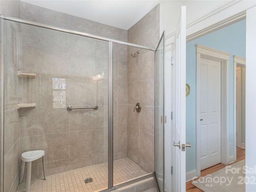 95 Greenwells Glory Drive, Biltmore Lake, NC 28715.  MLS# CAR4247434, YatesRealty ID 16530. Tiled, walk-in shower