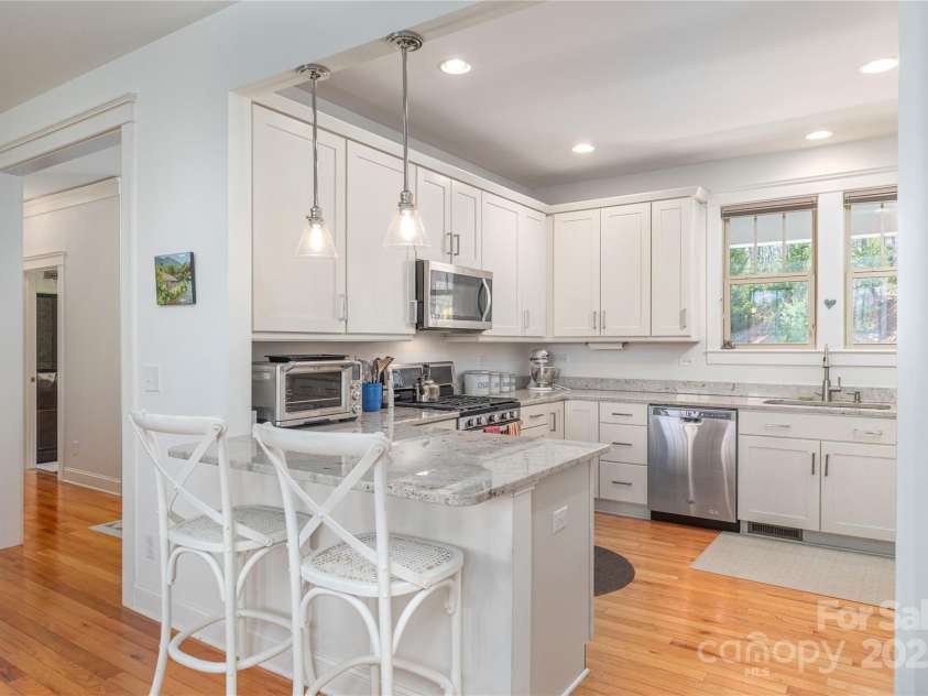 95 Greenwells Glory Drive, Biltmore Lake, NC 28715.  MLS# CAR4247434, YatesRealty ID 16530. Well appointed kitchen with wonderful walk-in pantry