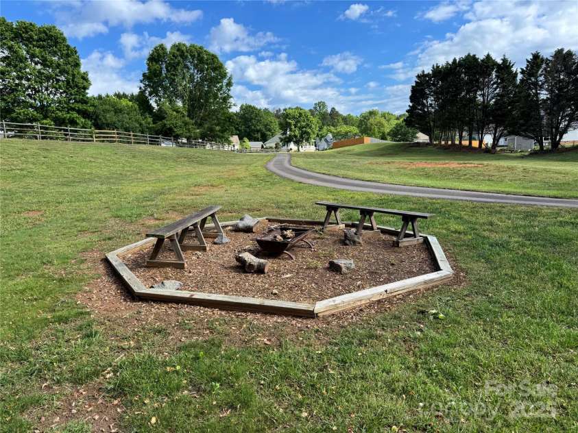 13223 Willow Breeze Lane, Huntersville, NC 28078.  MLS# CAR4257331, YatesRealty ID 16536. Community fire pit-Walking trails