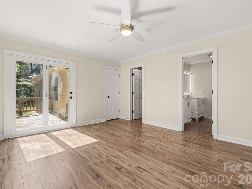 10542 Blair Road, Mint Hill, NC 28227.  MLS# CAR4360298, YatesRealty ID 16539. Master Bedroom with Deck