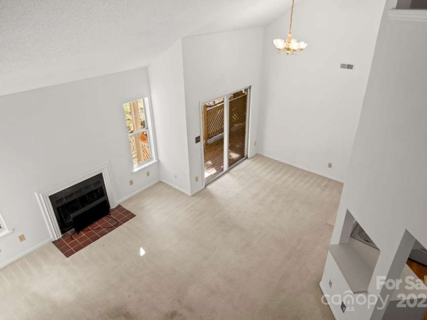 6523 Clavell Lane, Charlotte, NC 28210.  MLS# CAR4315842, YatesRealty ID 16540. Bonus room looking down to living area