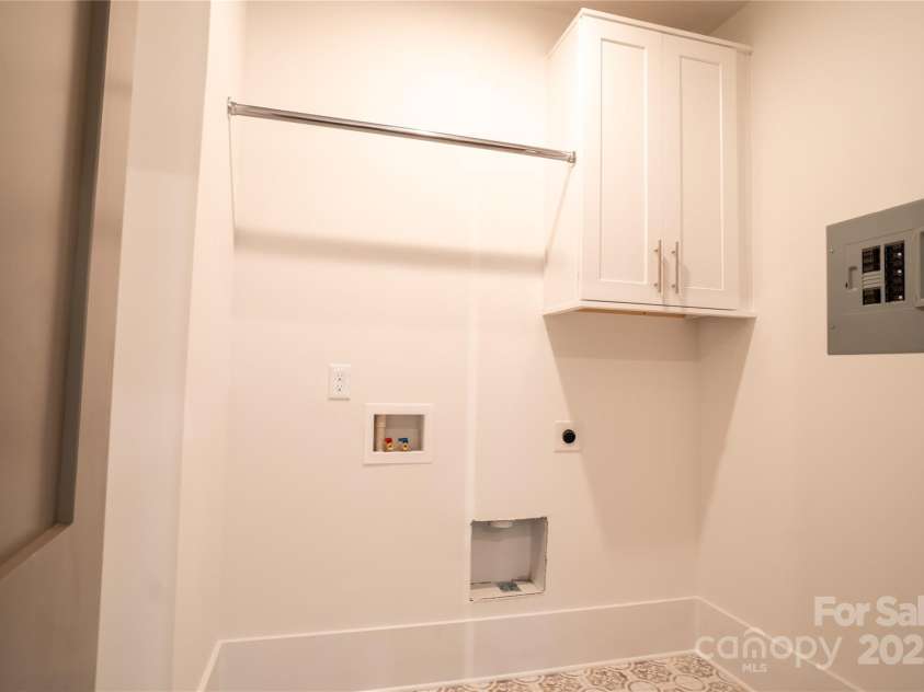 720 Ideal Way, Charlotte, NC 28209.  MLS# CAR4215496, YatesRealty ID 16548. Second Floor Laundry Room