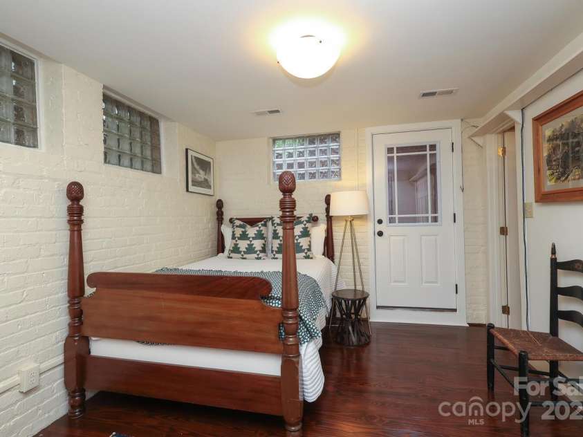 801 Berkeley Avenue, Charlotte, NC 28203.  MLS# CAR4243882, YatesRealty ID 16552. Basement space that is current being used as a 4th bedroom but could easily be repurposed for other use.