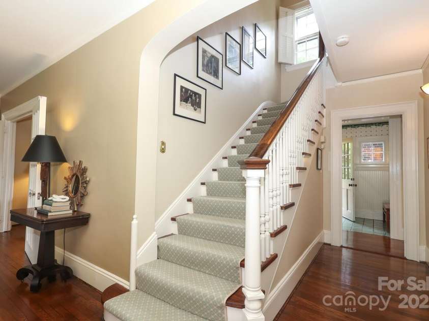 801 Berkeley Avenue, Charlotte, NC 28203.  MLS# CAR4243882, YatesRealty ID 16552. Beautiful tradtional wide staircase filled with natural light