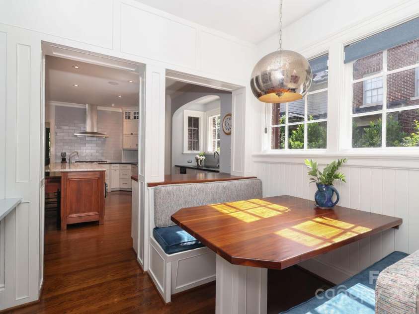 801 Berkeley Avenue, Charlotte, NC 28203.  MLS# CAR4243882, YatesRealty ID 16552. Breakfast nook with built in bench and custom lighting