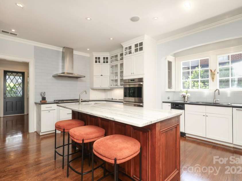 801 Berkeley Avenue, Charlotte, NC 28203.  MLS# CAR4243882, YatesRealty ID 16552. Light filled kitchen with custom cabinetry and beautifully curated finishes throughout