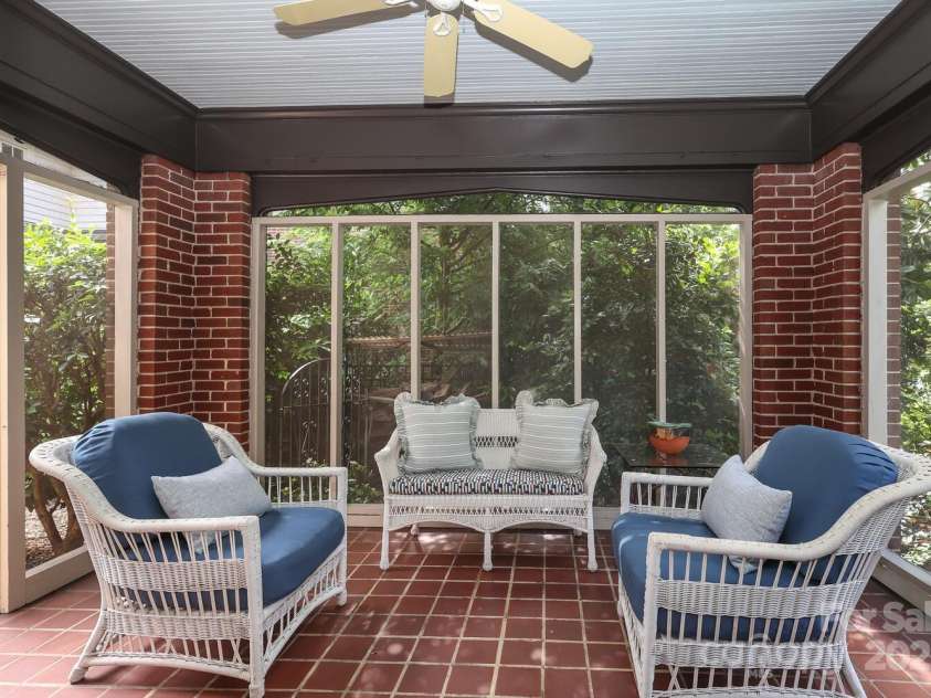 801 Berkeley Avenue, Charlotte, NC 28203.  MLS# CAR4243882, YatesRealty ID 16552. Screened porch with access to side yard