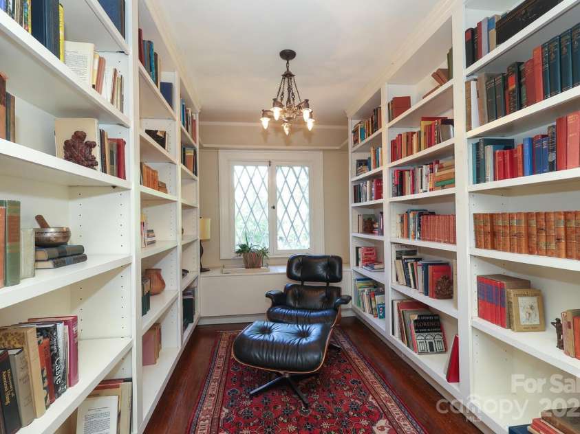 801 Berkeley Avenue, Charlotte, NC 28203.  MLS# CAR4243882, YatesRealty ID 16552. Second floor landing  area with built in bookshelves.