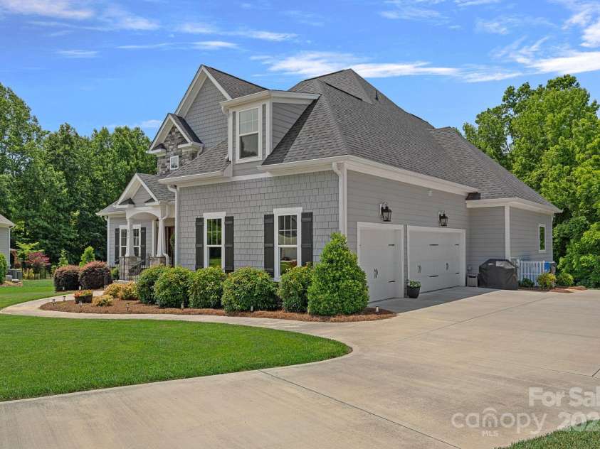 224 Hidden Meadows Drive, Mooresville, NC 28117.  MLS# CAR4263659, YatesRealty ID 16557. 3 Car side load garage
