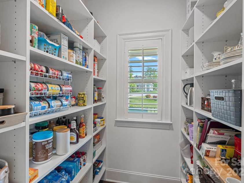 224 Hidden Meadows Drive, Mooresville, NC 28117.  MLS# CAR4263659, YatesRealty ID 16557. Large walk-in pantry