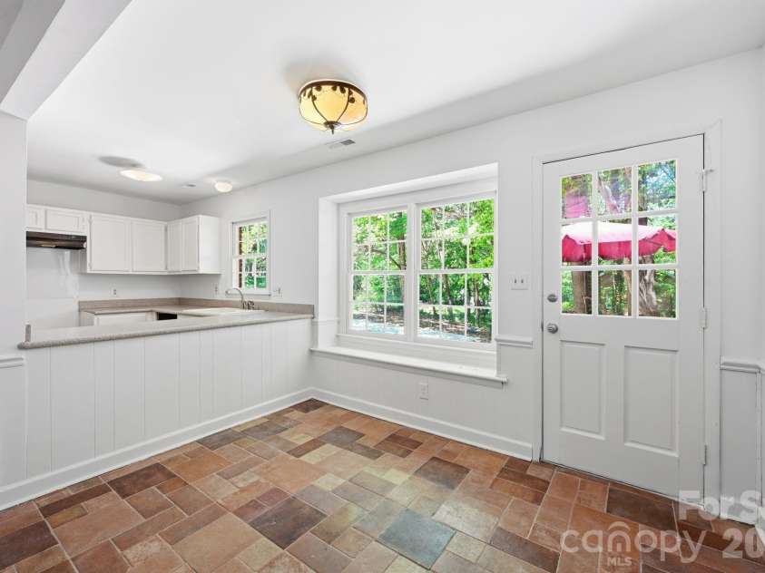 9701 Enid Lane, Matthews, NC 28105.  MLS# CAR4373941, YatesRealty ID 16557. Breakfast Area overlooking Back Deck