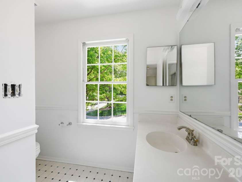 9701 Enid Lane, Matthews, NC 28105.  MLS# CAR4373941, YatesRealty ID 16557. Primary Bath