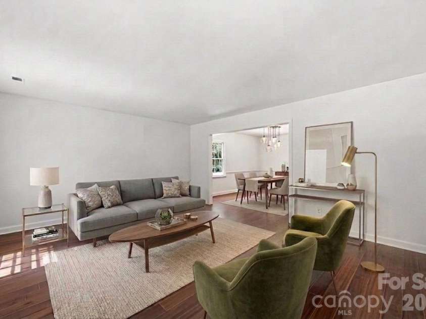 9701 Enid Lane, Matthews, NC 28105.  MLS# CAR4373941, YatesRealty ID 16557. Virtually Staged Living Room