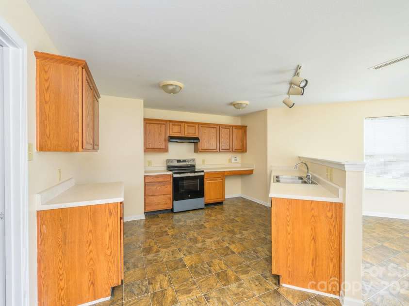 4521 Palustris Court, Charlotte, NC 28269.  MLS# CAR4259563, YatesRealty ID 16562. 
