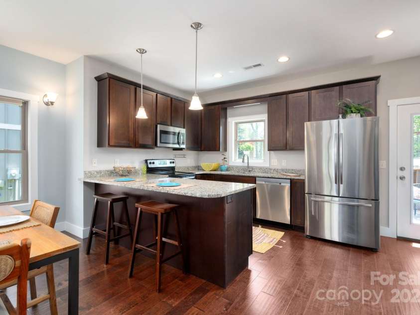 15 Gratitude Drive, Asheville, NC 28806.  MLS# CAR4254992, YatesRealty ID 16563. If you choose to cook in rather than walk to Haywood...